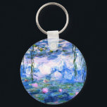 Monet Pink Water Lilies  Keychain<br><div class="desc">A Monet pink water lilies button keychain featuring beautiful pink water lilies floating in a calm blue pond with lily pads. A great Monet gift for fans of impressionism and French art. Serene nature impressionism with lovely flowers and scenic pond landscape.</div>