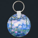Monet Pink Water Lilies  Keychain<br><div class="desc">A Monet pink water lilies button keychain featuring beautiful pink water lilies floating in a calm blue pond with lily pads. A great Monet gift for fans of impressionism and French art. Serene nature impressionism with lovely flowers and scenic pond landscape.</div>