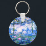 Monet Pink Water Lilies Keychain<br><div class="desc">A Monet pink water lilies button keychain featuring beautiful pink water lilies floating in a calm blue pond with lily pads. A great Monet gift for fans of impressionism and French art. Serene nature impressionism with lovely flowers and scenic pond landscape.</div>