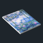 Monet Pink Water Lilies Notepad<br><div class="desc">A Monet pink water lilies notepad featuring beautiful pink water lilies floating in a calm blue pond with lily pads. A great Monet gift for fans of impressionism and French art. Serene nature impressionism with lovely flowers and scenic pond landscape.</div>