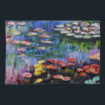 Monet Purple Water Lilies Kitchen Towel<br><div class="desc">Monet Purple Water Lilies kitchen towel. Oil painting on canvas from c. 1917. French impressionist Claude Monet remains renowned and beloved for the water lily paintings that he created at Giverny. This specific water lily painting features a diverse array of colours including fiery reds, haunting blues, and dreamy purples. A...</div>