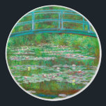 Monet The Japanese Footbridge Ceramic Knob<br><div class="desc">Turn a simple detail into a masterpiece! This ceramic knob features Claude Monet’s The Japanese Footbridge (1899), a romantic Impressionist painting from his garden in Giverny. The arched bridge over shimmering water glows with vibrant shades of green, pink, and blue, reimagined here as a decorative home accent. On a knob,...</div>