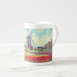 Monet Tulips Windmill Bone China Mug<br><div class="desc">Bone China Mug featuring Claude Monet’s flower and windmill painting. Beautiful and colorful fields of red,  pink,  and yellow tulips next to a windmill and house in Holland. A great Monet gift for fans of impressionism and French art.</div>