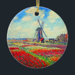 Monet Tulips Windmill Ceramic Ornament<br><div class="desc">Ceramic Ornament featuring Claude Monet’s flower and windmill painting. Beautiful and colourful fields of red,  pink,  and yellow tulips next to a windmill and house in Holland. A great Monet gift for fans of impressionism and French art.</div>