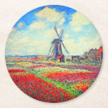 Monet Tulips Windmill Round Paper Coaster<br><div class="desc">Coasters featuring Claude Monet’s flower and windmill painting. Beautiful and colourful fields of red,  pink,  and yellow tulips next to a windmill and house in Holland. A great Monet gift for fans of impressionism and French art.</div>