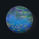 Monet Water Lilies 1906 2 Inch Round Button<br><div class="desc">Button featuring Claude Monet’s oil painting Water Lilies (1906). A serene still life of the interplay between light and reflection upon beautiful water lilies in a pond. A great gift for fans of impressionism and French art.</div>