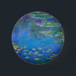 Monet Water Lilies 1906 2 Inch Round Button<br><div class="desc">Button featuring Claude Monet’s oil painting Water Lilies (1906). A serene still life of the interplay between light and reflection upon beautiful water lilies in a pond. A great gift for fans of impressionism and French art.</div>