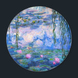 Monet Water Lilies Magnet<br><div class="desc">Monet Water Lilies magnet. Oil painting on canvas from 1916. Monet painted his famous water lily pond obsessively during the final years of his career, drawing inspiration from the light of the sun and its shifting effect on the water and the aquatic flowers and foliage. This painting features a vibrant...</div>