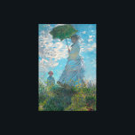 Monet Woman with a Parasol Fine Art Canvas Print<br><div class="desc">Woman with a Parasol, or Madam Monet and Her Son, are the two titles used for this popular classic Impressionism painting by French artist, Claude Monet, c. 1875. It is an Impressionist style everyday family scene portrait of Claude Monet's wife, Camille and their son, out for a stroll on a...</div>