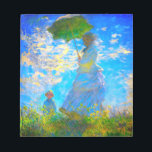 Monet Woman with a Parasol Notepad<br><div class="desc">A family portrait notepad featuring Claude Monet’s wife,  Camille,  holding a parasol,  and their son,  Jean,  taking a walk in a vibrant green field being blown by the wind on a summer’s day. A great Monet gift for fans of impressionism and French art.</div>