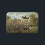 Monet's Garden at Argenteuil by Claude Monet Bath Mat<br><div class="desc">The Artist's Garden in Argenteuil (A Corner of the Garden with Dahlias) (1873) by Claude Monet is a vintage impressionism fine art floral nature painting. A country farm house is in the background. A couple in love is walking past a romantic spring season garden with blooming roses and other flowers....</div>