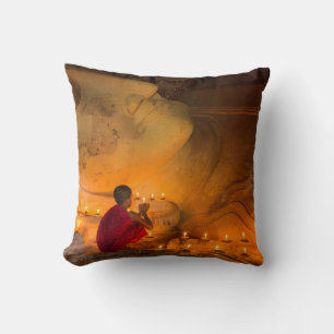 Monk Praying By A Buddha Throw Pillow
