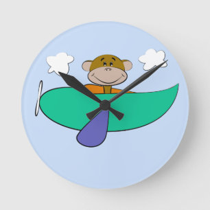 Monkey in Colourful Airplane Round Clock
