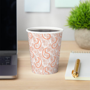 Monochrome beige white orange paisley pattern. paper cups