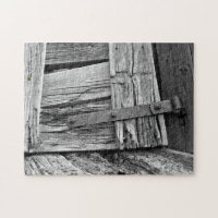 Monochrome Dilapidated Corral Gate Photograph