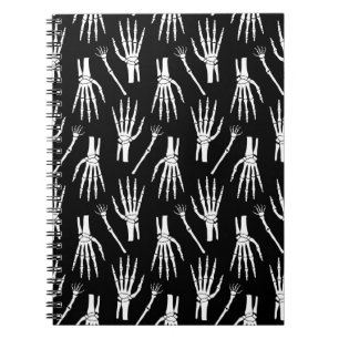 Monochrome Halloween seamless pattern with bones. Notebook
