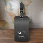 Monogram Black Brushed Metallic Elegant Luggage Tag<br><div class="desc">Elevate your travel experience with our Classic Elegant Modern Minimalist Monogram Luggage Tag. This meticulously designed accessory seamlessly combines timeless elegance with contemporary minimalism, ensuring your luggage stands out with sophistication. Crafted with precision and attention to detail, this luggage tag is more than just a practical item; it's a personalized...</div>