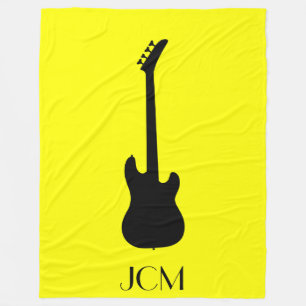 Monogram Black Electric Bass Guitar on Yellow Fleece Blanket