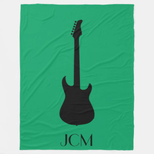 Monogram Black Electric Guitar on Green Fleece Blanket