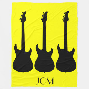 Monogram Black Electric Guitars on Yellow Fleece Blanket