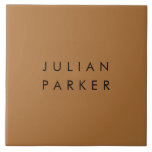 Monogram black minimalist brown tile<br><div class="desc">A sleek and timeless monogram takes centre stage against a rich brown background,  capturing minimalist elegance in its purest form. The juxtaposition of black initials on the warm backdrop creates a balanced and distinguished design,  ideal for adding a touch of personal refinement to any setting.</div>