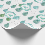 Monogram Christmas Trees Wrapping Paper<br><div class="desc">Decorate your Christmas gifts with this modern Christmas tree patterned wrapping paper.
It is decorated with a simple watercolor in shades of green and turquoise.
Customize it with your initial or that of your family.
Original Watercolor © Michele Davies.</div>
