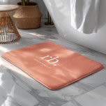 Monogram Coral Peach Elegant Feminine Minimalist Bath Mat<br><div class="desc">A minimalist monogram design with large typography initials in a classic font with your name below on a feminine coral peach background. The perfectly custom gift or accessory!</div>