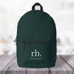 Monogram Dark Green Stylish Modern Minimalist Printed Backpack<br><div class="desc">A minimalist monogram design with large typography initials in a classic font with your name below on a dark green background. The perfectly custom gift or accessory!</div>