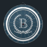 Monogram design dartboard<br><div class="desc">Monogram design with laurel wreath decoration in striped round shape on blue background</div>