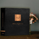Monogram elegant black gold script wedding album binder<br><div class="desc">Luxury exclusive looking monogrammed scrapbook wedding album binder featuring a faux gold copper metallic square over a stylish black faux leather background.</div>