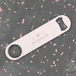 Monogram Elegant Minimal Blush Pink and Gold Bar Key<br><div class="desc">A simple stylish custom monogram design in a gold modern minimalist typography on an elegant pastel blush pink background. The monogram initials and name can easily be personalized along with the feature line to make a design as unique as you are! The perfect bespoke gift or accessory for any occasion....</div>