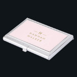 Monogram Elegant Minimal Blush Pink and Gold Business Card Holder<br><div class="desc">A simple stylish custom monogram design in a gold modern minimalist typography on an elegant pastel blush pink background. The monogram initials and name can easily be personalized along with the feature line to make a design as unique as you are! The perfect bespoke gift or accessory for any occasion....</div>