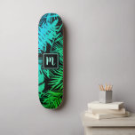 Monogram green turquoise ombre leaf pattern cool skateboard<br><div class="desc">Bring a bit of the jungle tropics to your city streets whenever you use cool, chic, modern skateboard sporting a handwritten monogram initial over a graphic palm leaf pattern of vivid, distressed teal blue, turquoise and green ombre gradations on black. Makes a fun and stylish statement every time you surf...</div>