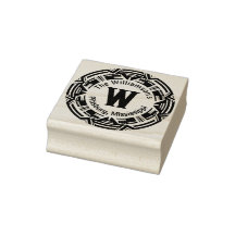 Monogram has a bold round surround with name