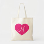 Monogram hot pink heart tote bag<br><div class="desc">This canvas bag features a shapely hot pink heart overlaid by a template text monogram initial.  Click "Customize" to re-size/re-position hot pink heart ,  personlize text or monogram with your choice of font style,  size,  and colour. Great bridesmaid gift.</div>