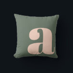 Monogram Initial Letter Bold Earthy Pink Green  Throw Pillow<br><div class="desc">A contemporary throw pillow featuring a deep sage green background with a large blush pink lowercase letter in bold typography. This stylish and minimalist design is perfect for modern, boho, or mid-century home decor, adding a touch of sophistication and personality to any space. Ideal for living rooms, bedrooms, or office...</div>
