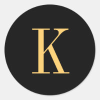 Monogram K gold-coloured on black background
