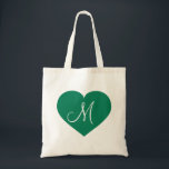Monogram Kelly Green Heart Tote Bag<br><div class="desc">This tote bag features a kelly green heart with a white monogram initial at its centre. Personalize by re-sizing/repositioning green heart and/or personalizing text/monogram. Great bridesmaid gift.</div>