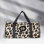 Monogram Leopard Skin Pattern, Modern Animal Style Duffle Bag<br><div class="desc">Introducing PixeliaDesigns' Leopard Skin Modern Animal Pattern Monogram Duffel Bag, tailor-made for the fashion-forward woman. This duffel combines a chic leopard print with the practicality needed for dance, travel, exercise, or any outdoor activity. Featuring a personalized monogram and name, it sets you apart, making it a unique accessory that reflects...</div>