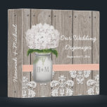 Monogram Mason Jar Peach Hydrangea Wedding Planner Binder<br><div class="desc">Pretty rustic style monogrammed mason jar binder with a white hydrangea flower and a wooden fence and antique damask pattern lace background and stitched peach and light coral ribbon. This wedding organizer can be personalized with the initials and monogram of the bride and groom on the mason jar and customized...</div>