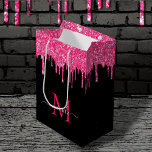 Monogram Metallic Hot Pink Dripping Glitter Black Medium Gift Bag<br><div class="desc">**Monogram Metallic Hot Pink Dripping Glitter Black Medium Gift Bag** This monogram black and metallic bright neon hot pink dripping faux sparkling glitter custom paper gift bag template allows you to quickly add any name to the front and back with ease, using Zazzle's quick and easy personalization tool. TIP: in...</div>
