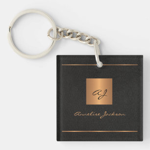 Monogram modern black gold elegant script name keychain