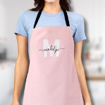 Monogram Name Elegant Minimal Blush Pink Apron<br><div class="desc">Personalized Custom Blush Pink Initial Name Monogram Apron. This girly and feminine apron is perfect for adding a stylish and personal touch to your work attire. Whether you're a florist arranging blooms, a hair stylist in the salon, or a chef whipping up creations in the kitchen, this apron combines elegance...</div>