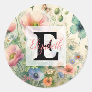 Monogram name on vintage watercolor flowers  classic round sticker