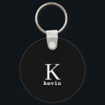 Monogram name personalized black elegant modern keychain<br><div class="desc">Modern men monogrammed stylish keychain with black and white script (changeable colours).            Personalize it with name and initial letter. It can be a classy gift for a boyfriend,  husband,  dad,  uncle on birthday,  Christmas,  or any other anniversary or occasion.</div>