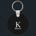 Monogram name personalized black elegant modern keychain<br><div class="desc">Modern men monogrammed stylish keychain with black and white script (changeable colours).            Personalize it with name and initial letter. It can be a classy gift for a boyfriend,  husband,  dad,  uncle on birthday,  Christmas,  or any other anniversary or occasion.</div>