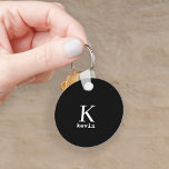 Monogram name personalized black elegant modern keychain<br><div class="desc">Modern men monogrammed stylish keychain with black and white script (changeable colours).            Personalize it with name and initial letter. It can be a classy gift for a boyfriend,  husband,  dad,  uncle on birthday,  Christmas,  or any other anniversary or occasion.</div>