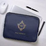 Monogram Navy Blue Faux Gold Vintage Crest Initial Laptop Sleeve<br><div class="desc">An elegant navy and gold design with the monogram initial in a vintage crest, recommended for a man. The crest is faux gold foil, the background is navy blue. Under the crest, in small caps, there is the name in golden caps. The vintage floral crest from an old book cover...</div>