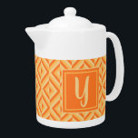 Monogram Orange Three-Tone Diamond Pattern<br><div class="desc">Make your tea in this Monogram Orange Three-Tone Diamond Pattern Teapot. It features a geometric diamond pattern in three shades of orange with an initial in light orange against a dark orange square. Personalize it with your initial. Give your teatime an extra pop of colour.</div>