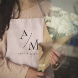 Monogram Pastel Pink Minimal Apron<br><div class="desc">Elevate your kitchen style with this Monogram Pink Minimalist Apron. Featuring a sleek and simple design, this apron combines functionality with elegance, making it perfect for both home cooks and professional chefs. The customizable monogram adds a personal touch, ensuring that you cook in style. Made from durable materials, this apron...</div>